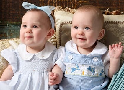 twin-girl-and-boy-in-blue-outfits