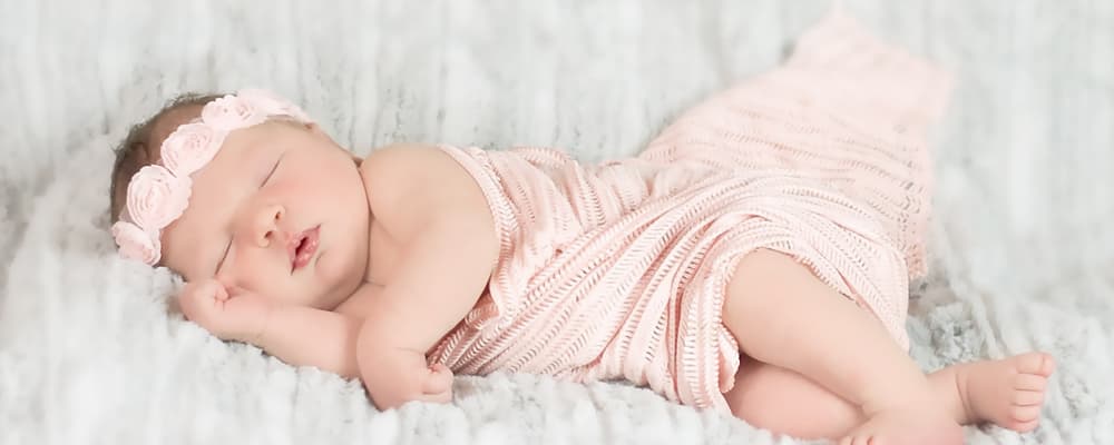 baby-girl-in-pink-blanket
